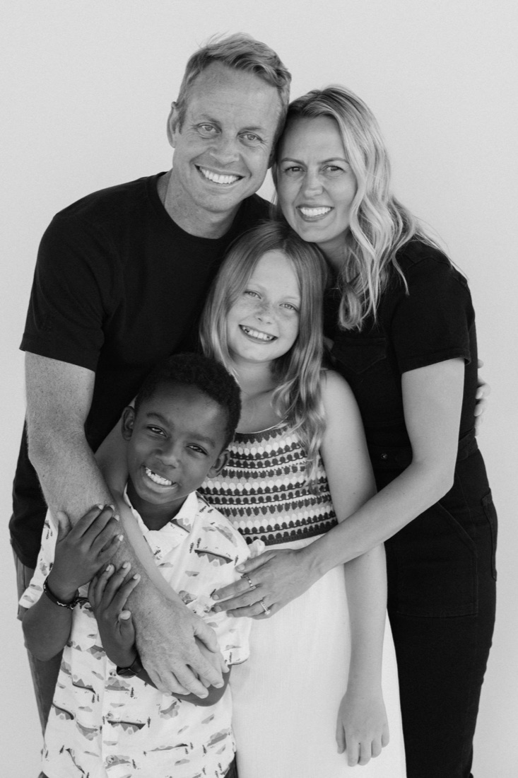 The same family standing together, photographed at last year's Fall Photo Event